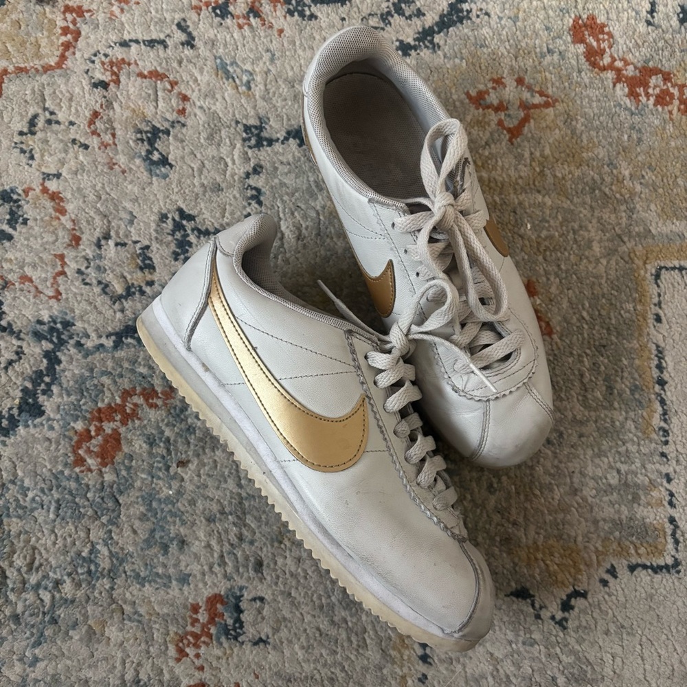 Nike Women's Cortez Sneakers in Off White and Gold